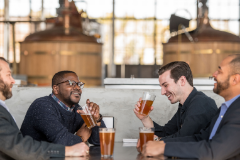 Men drinking at Hunter-Gatherer Brewery